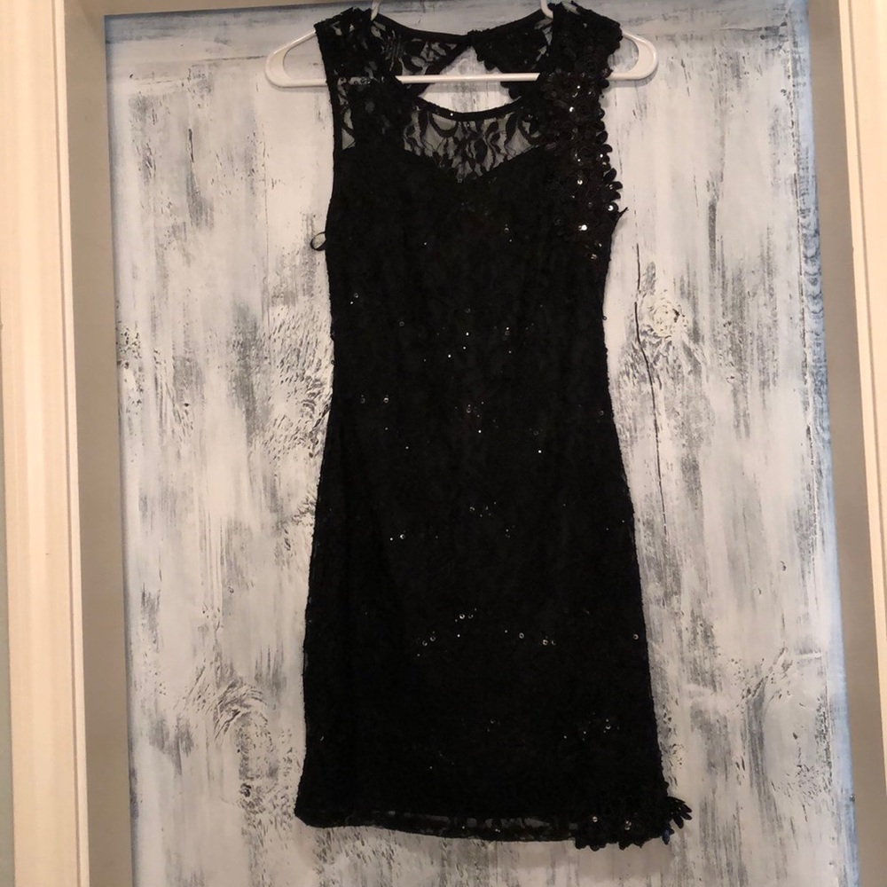 Black dress with sequin overlay